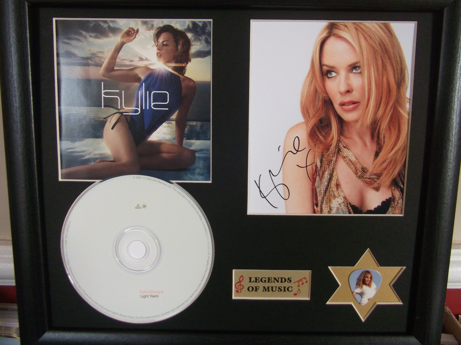 Foto met authentieke handtekening van Kylie Minogue Light Years